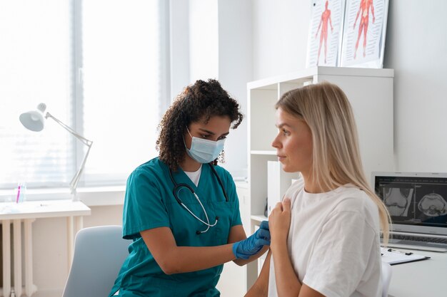 Female nurse practicing medicine at the clinic