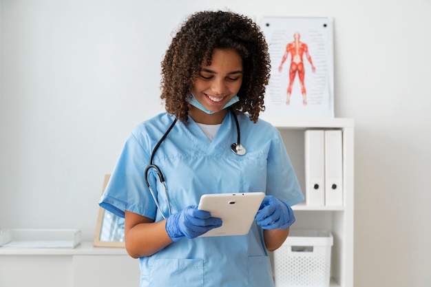 Female nurse working at the clinic