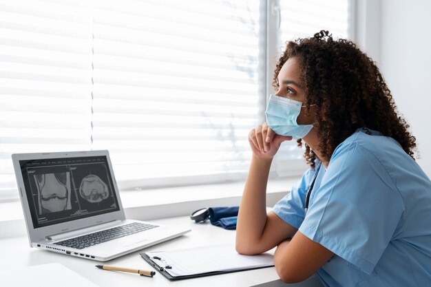 Female nurse working at the clinic