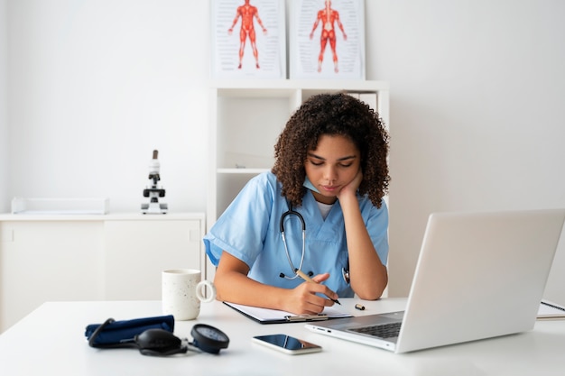 Female nurse working at the clinic