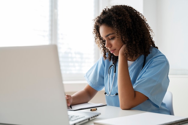 Female nurse working at the clinic