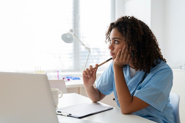 Female nurse working at the clinic