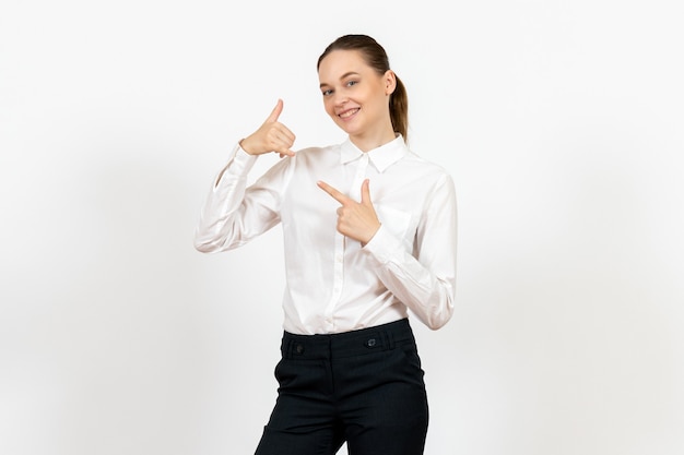 female office employee in elegant white blouse with smiling face on white