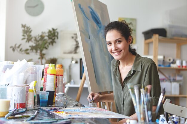 Female painter in her art studio