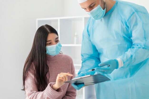 Female patient getting vaccinated for coronavirus