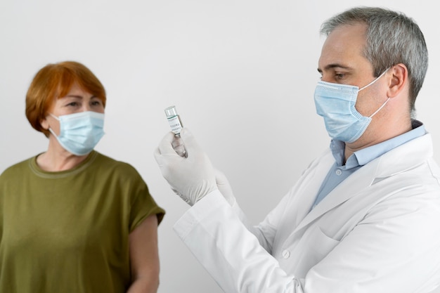 Female patient getting a vaccine