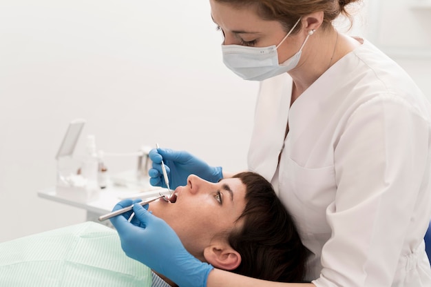 Female patient having a procedure done at the dentist