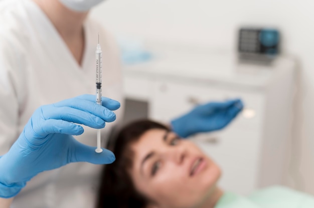 Female patient having a procedure done at the dentist