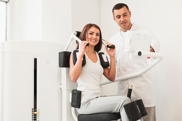 Female patient working out medical exercises