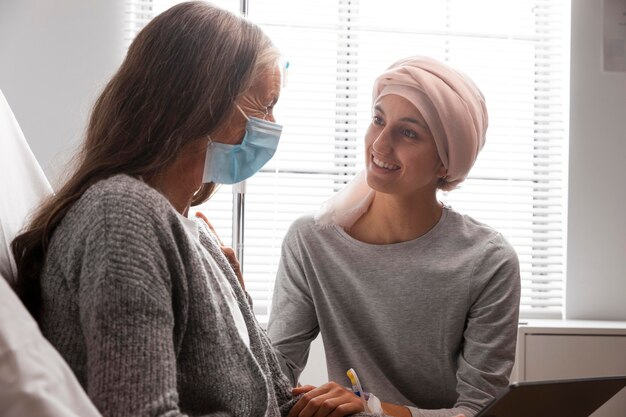 Female patients talking at the hospital indoors