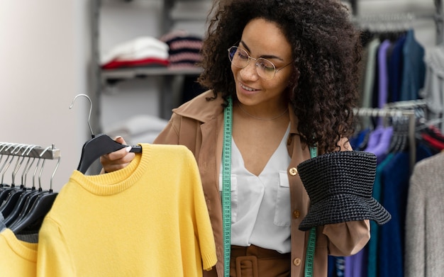 Female personal shopper in store working