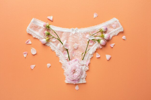 Female reproductive system concept with flowers