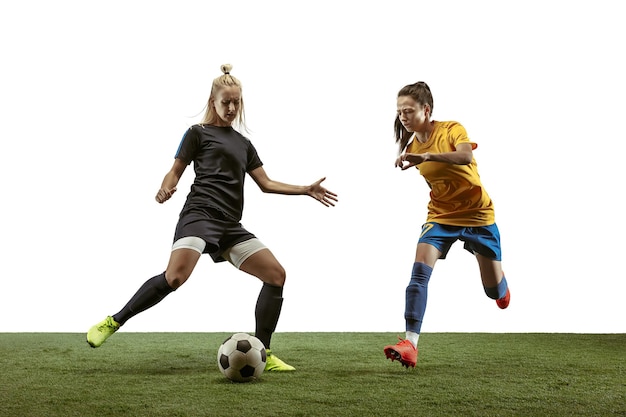 Female soccer players practicing and training at the stadium