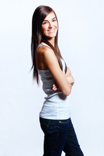 Female standing on white studio background