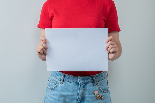 Free photo female student holding a blank project sheet