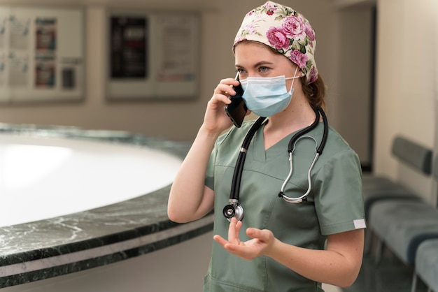 Free photo female student at medicine wearing medical mask