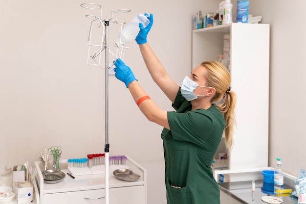 Free photo female student at medicine wearing medical mask