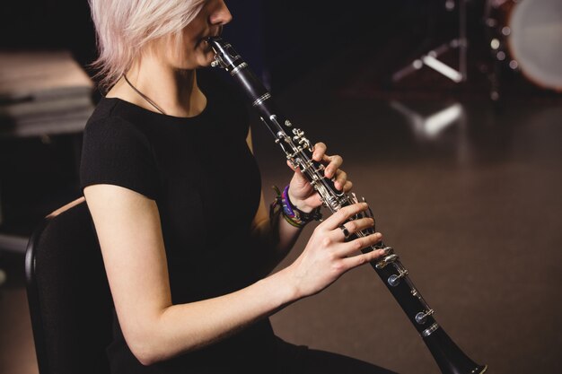 Female student playing clarinet