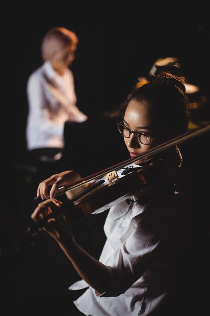 Female student playing violin