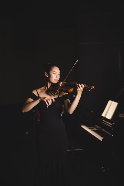 Female student playing violin