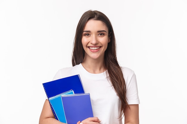 female student with books and paperworks