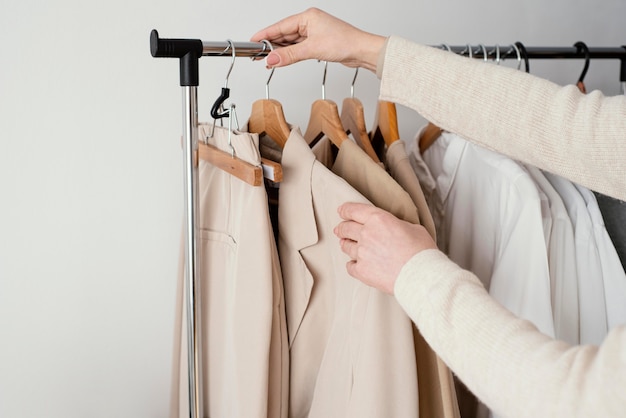 Female tailor checking garments