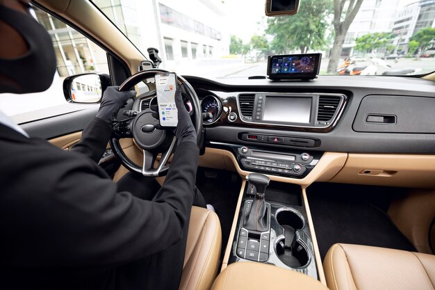 Female taxi driver paying attention to the road