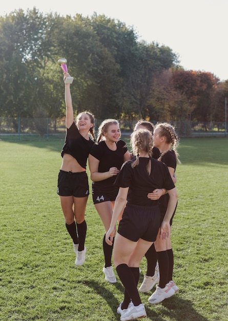 Female team celebrating a victory