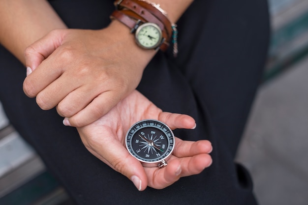 Female tourist with compass