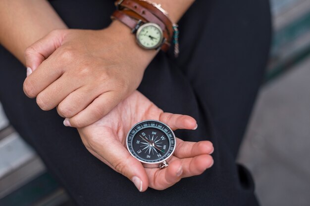 female tourist with compass