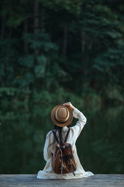 Female tourists spread their arms and held their wings