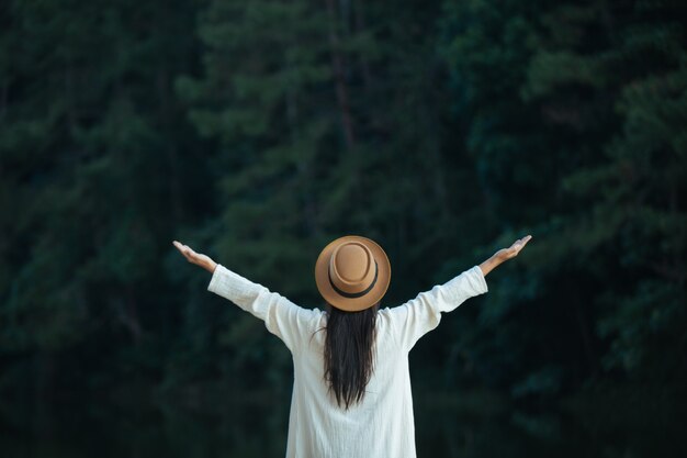 Female tourists spread their arms and held their wings