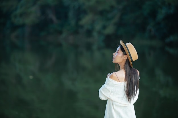 Female tourists spread their arms and held their wings