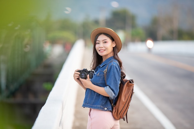 Female tourists who are taking photos of the atmosphere 