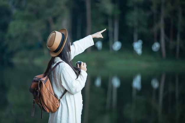 Female tourists who are taking photos of the atmosphere