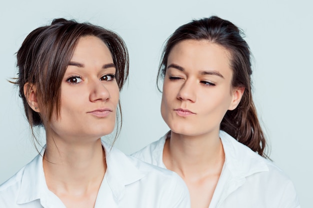 Female twins posing