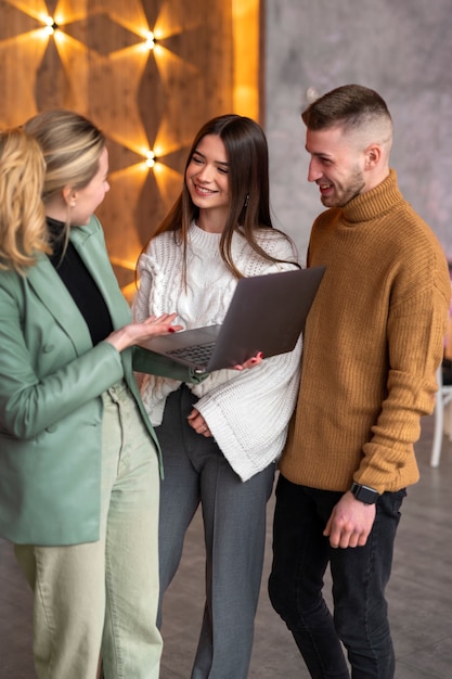 Female wedding planner working with couple