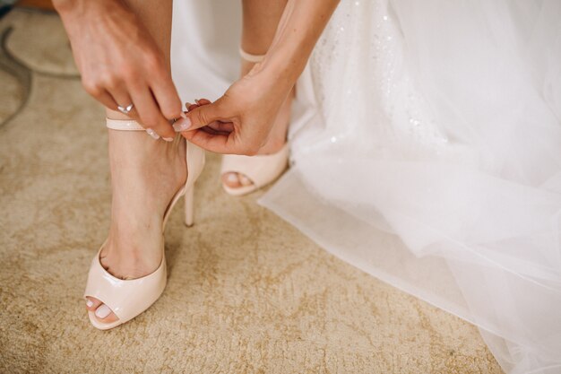 Female wedding shoes close up