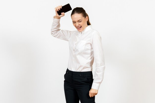 female worker in elegant white blouse feeling angry on white