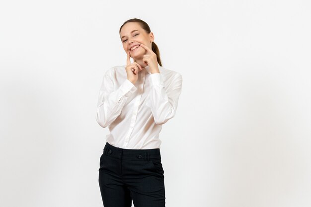 female worker in elegant white blouse smiling on white