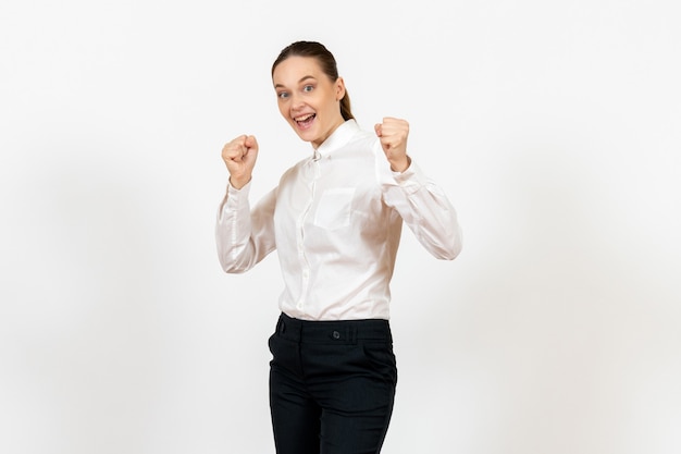 female worker in elegant white blouse with excited face on white