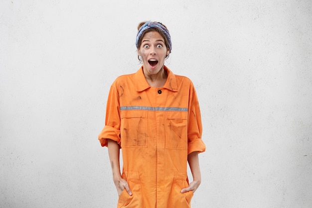 Free photo female worker wearing work clothes