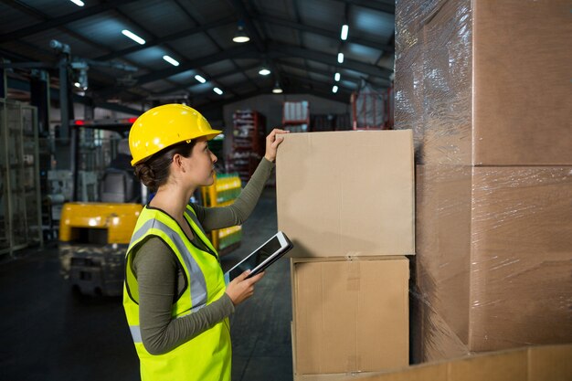 Female worker working in warehouse