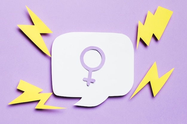 Feminine gender sign in speech bubble surrounded by thunders