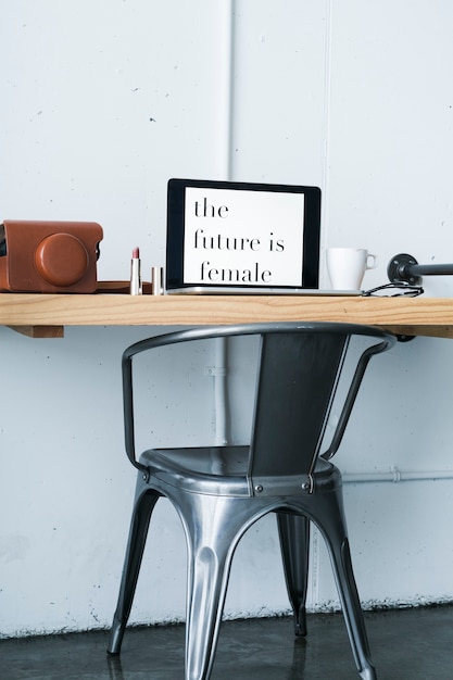 Feminine working desk with laptop