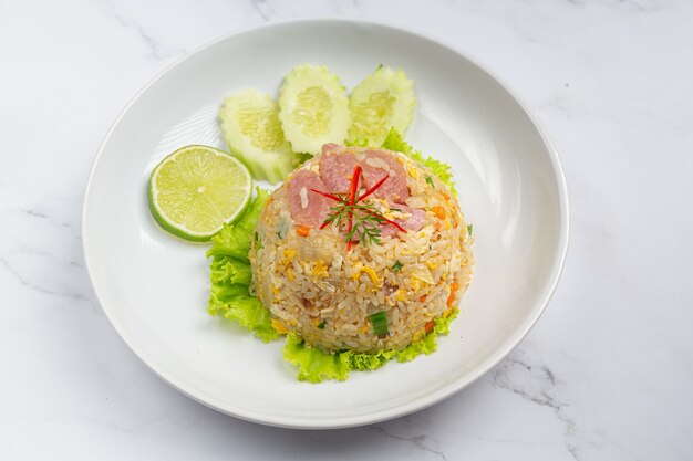 Fermented pork fried rice served with fresh cucumber