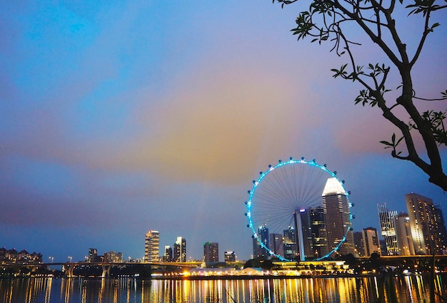 Free photo ferris wheel amusement cityscape city light concept