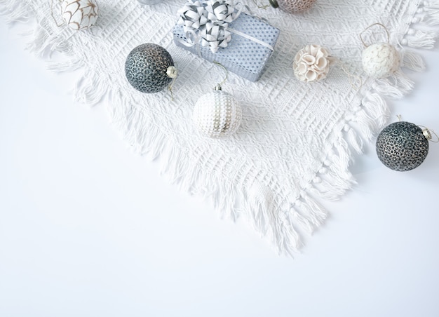Festive background with christmas gift and christmas balls