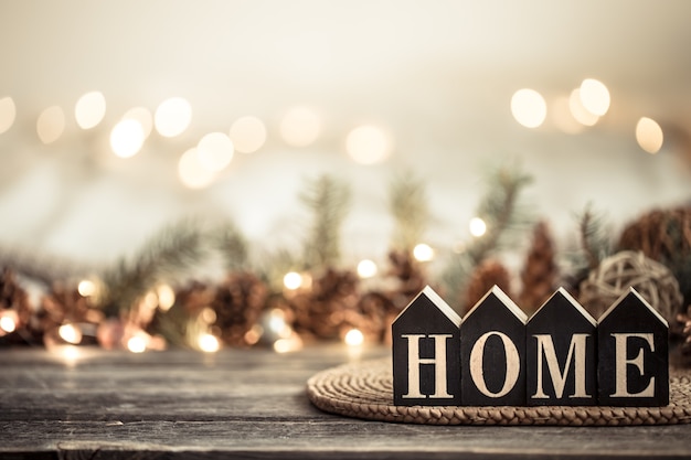 Festive background with lights with the inscription home