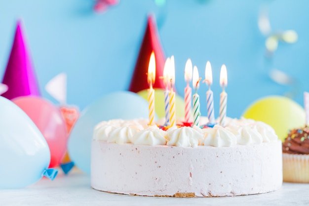 Festive cake and candles lighting